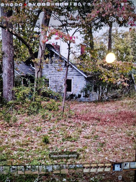 165 Strickland Street Fairburn, GA 30213 - Photo 1 of 1 a front view of a house with a yard