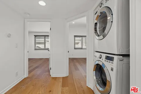 a view of livingroom with washer and dryer