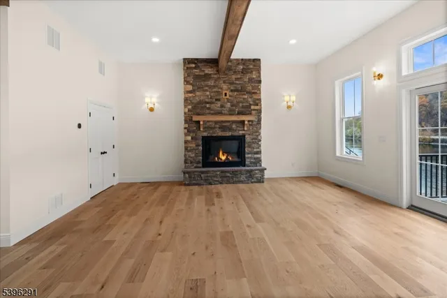 a view of an empty room with stairs