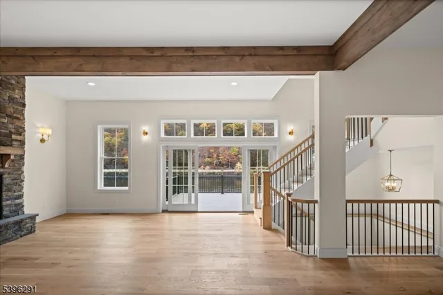 a view of a brick house with many windows