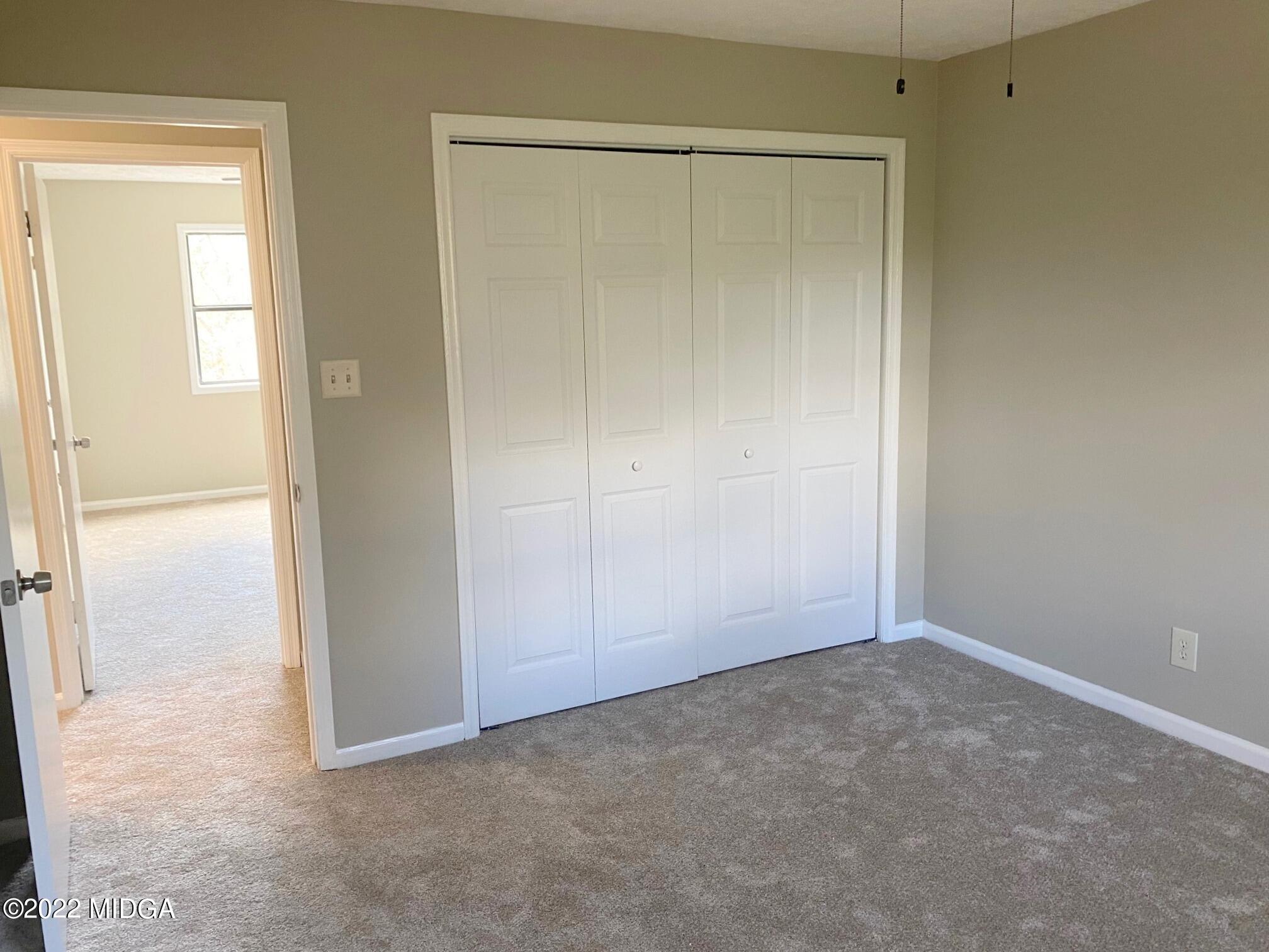 114 Pine Tree Road Macon, GA 31211 - Photo 6 of 18 an empty room with closet