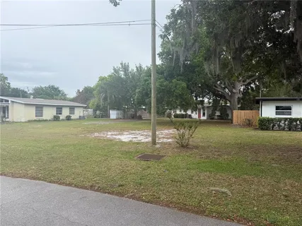 a view of a house with a park