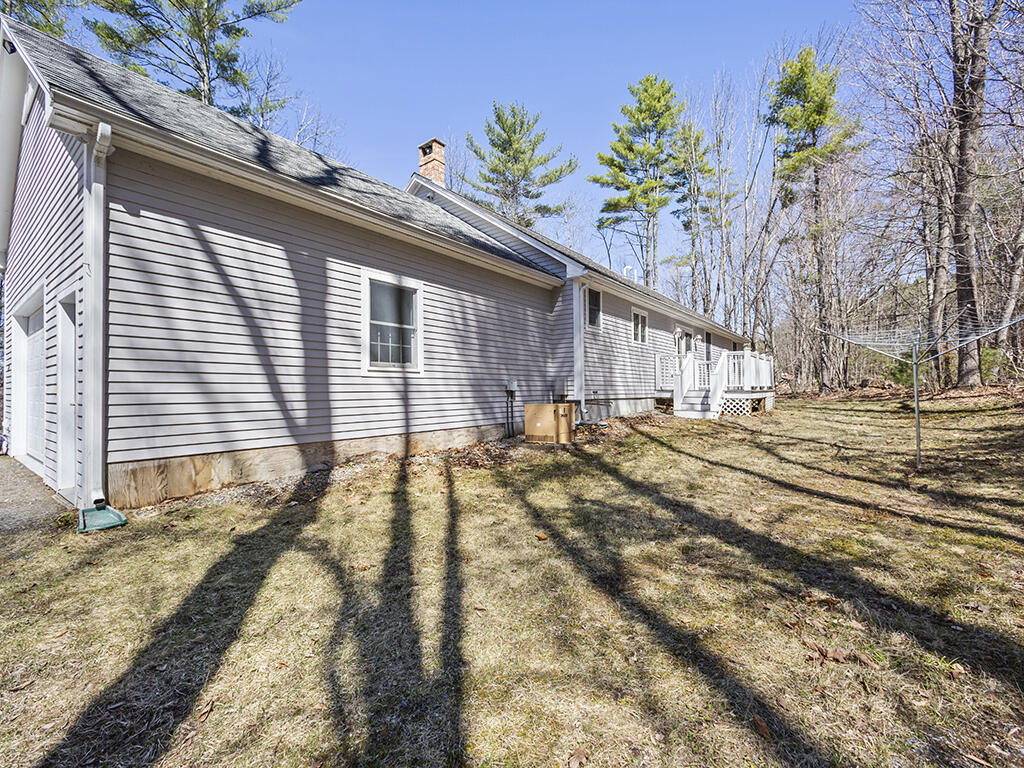 280 Pond Road Mount Vernon, ME 04352 - Photo 32 of 44 Back of home and generator