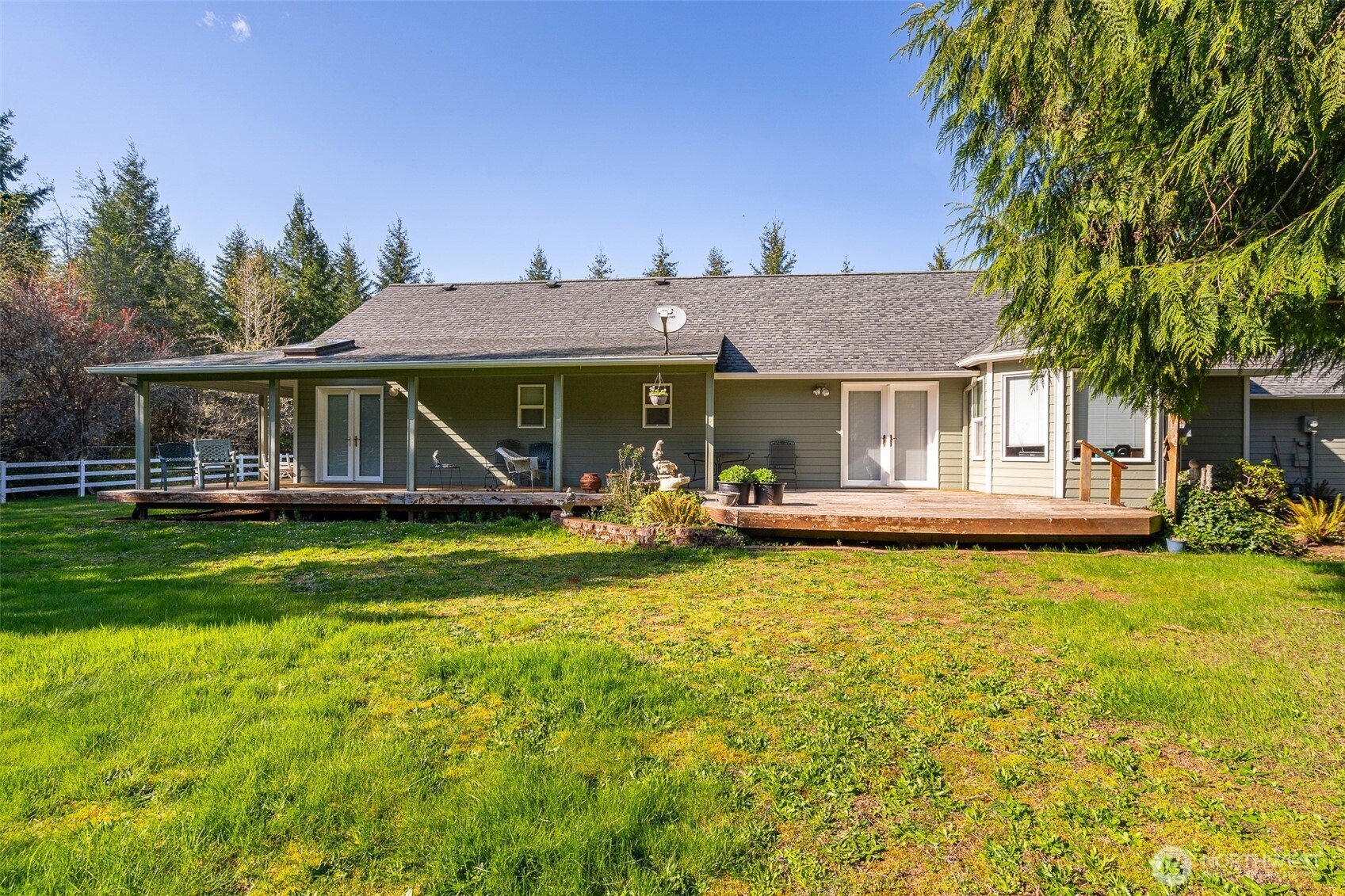 698 Logan Hill Road Chehalis, WA 98532 - Photo 35 of 35 a view of a house with pool and chairs