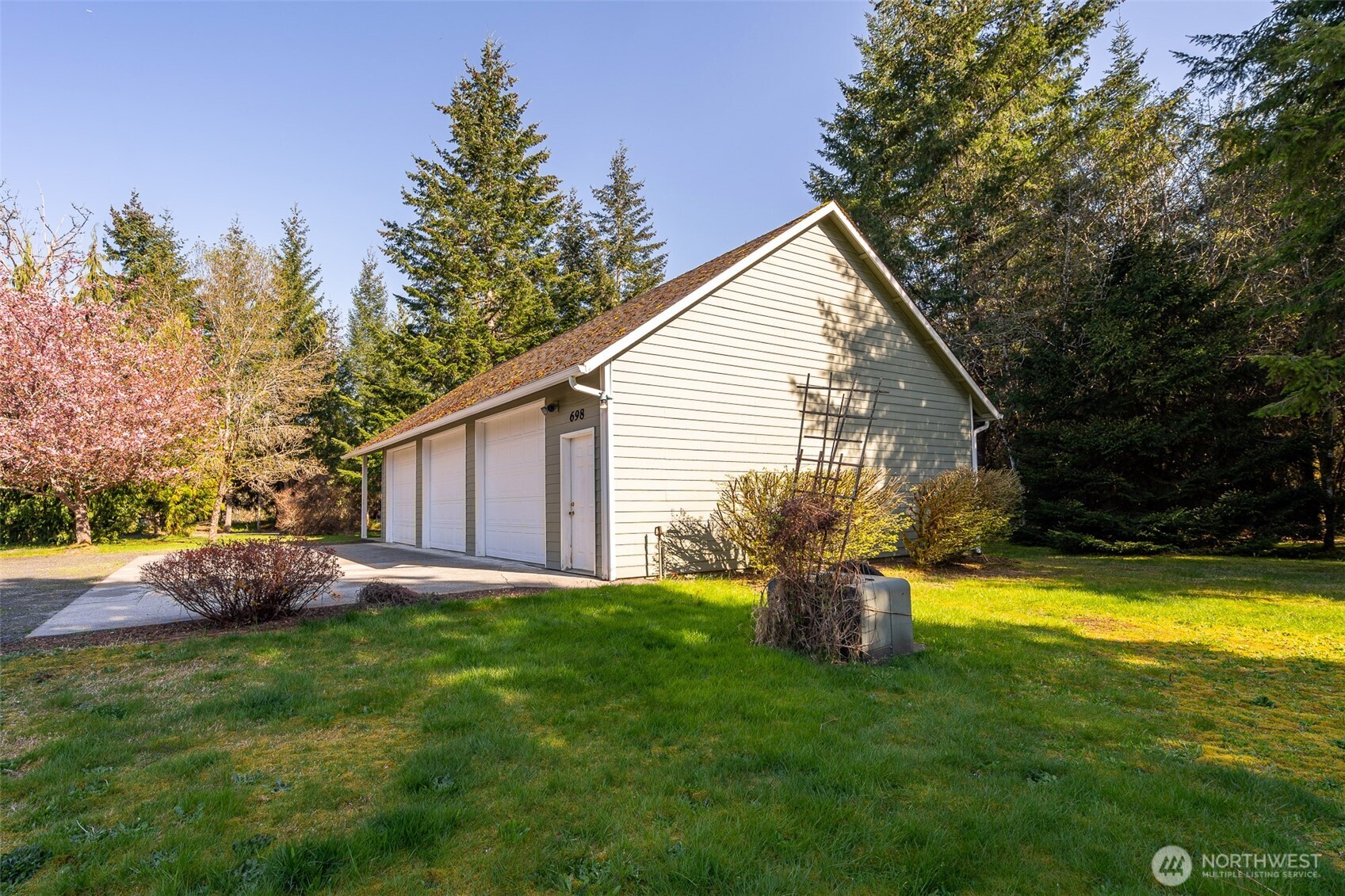 698 Logan Hill Road Chehalis, WA 98532 - Photo 9 of 35 a view of a house with backyard and sitting area