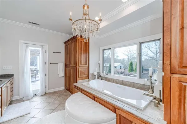 a utility room with sink dryer and washer