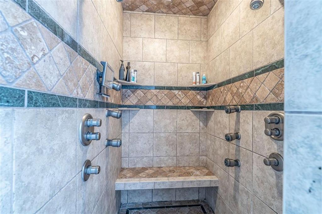 159 Ward Mountain Road Kingston, GA 30145 - Photo 23 of 75 a bathroom with a bath tub and shower