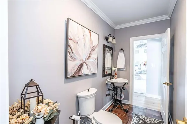 a living room with furniture or couch and a large window