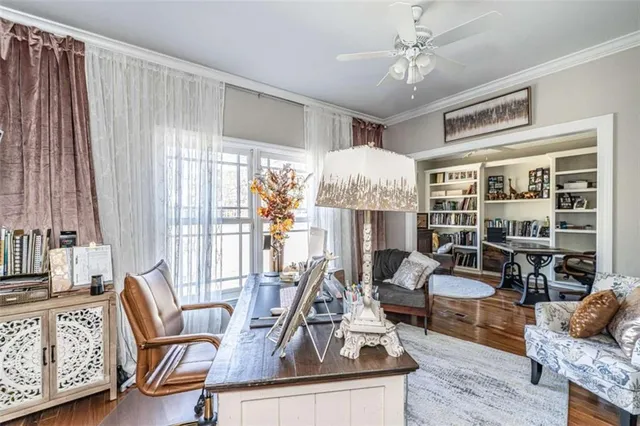 a living room with furniture a window and a table