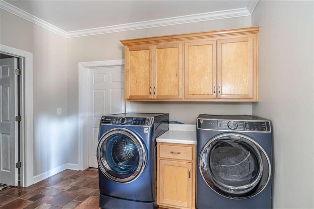 159 Ward Mountain Road Kingston, GA 30145 - Photo 30 of 75 a utility room with sink dryer and washer