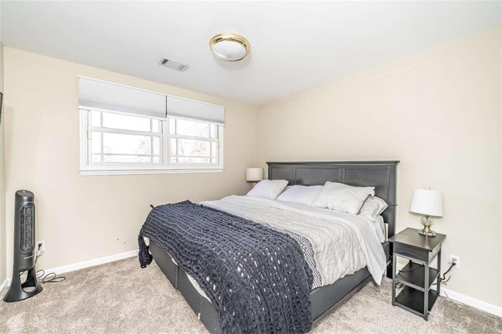 159 Ward Mountain Road Kingston, GA 30145 - Photo 36 of 75 a bedroom with a bed and a window