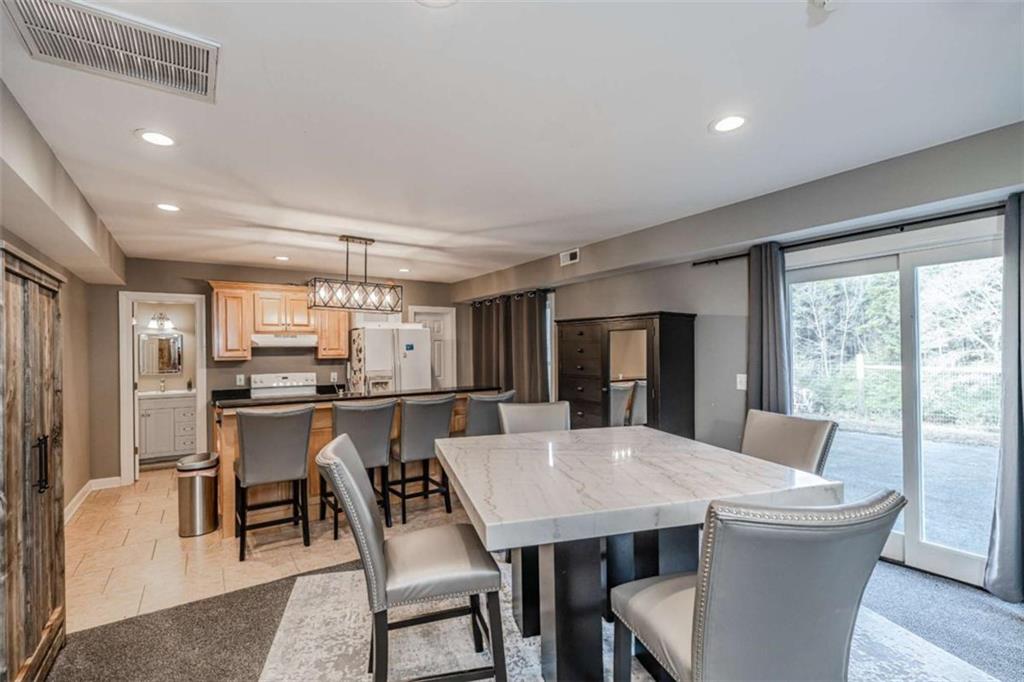 159 Ward Mountain Road Kingston, GA 30145 - Photo 40 of 75 a view of a dining room with furniture window and outside view