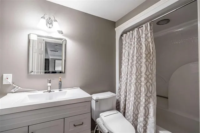 a view of a swimming pool with a lounge chair