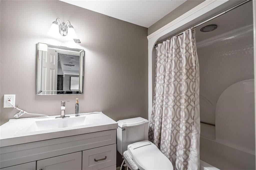 159 Ward Mountain Road Kingston, GA 30145 - Photo 41 of 75 a bathroom with a sink a toilet and shower