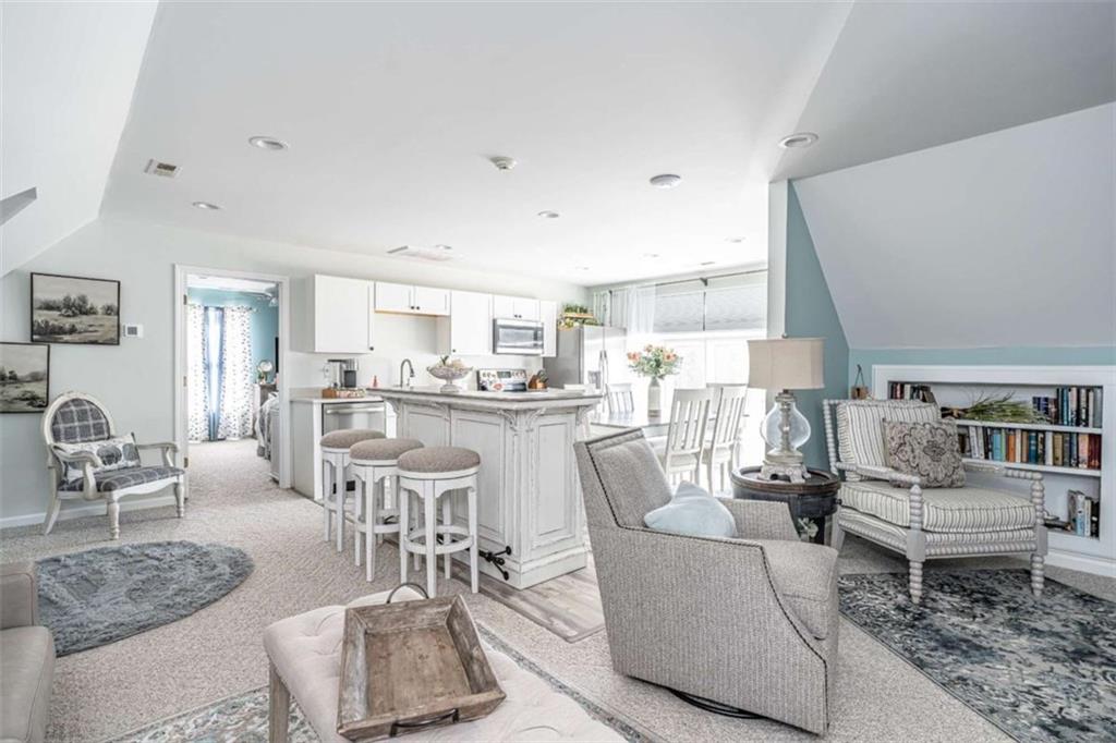 159 Ward Mountain Road Kingston, GA 30145 - Photo 45 of 75 a living room with furniture and a dining table with kitchen view