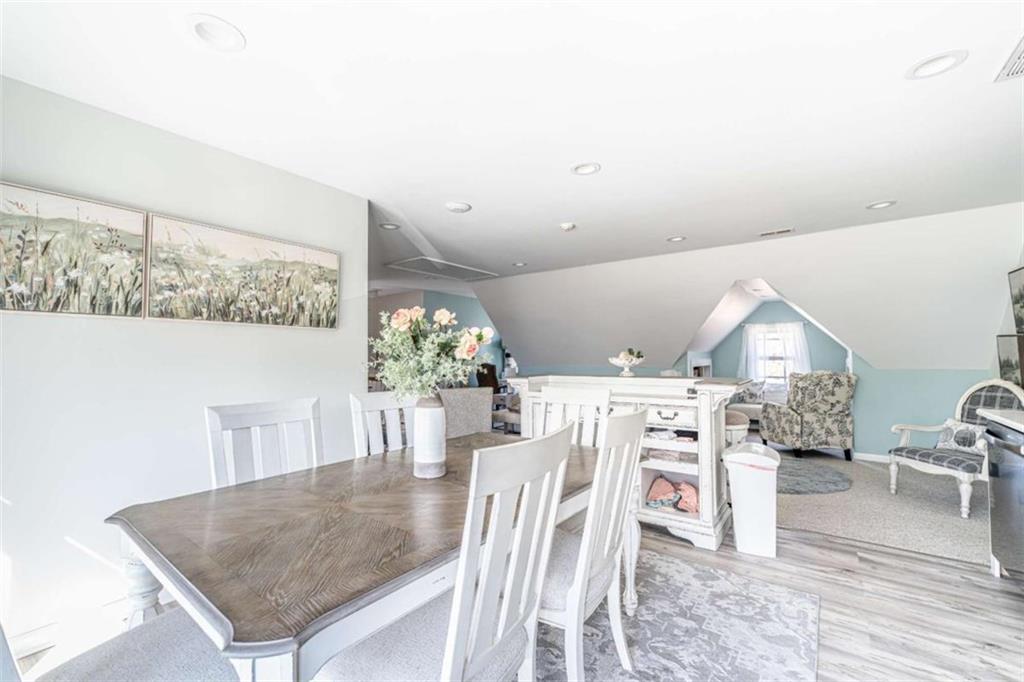 159 Ward Mountain Road Kingston, GA 30145 - Photo 48 of 75 a view of a dining room with furniture and wooden floor