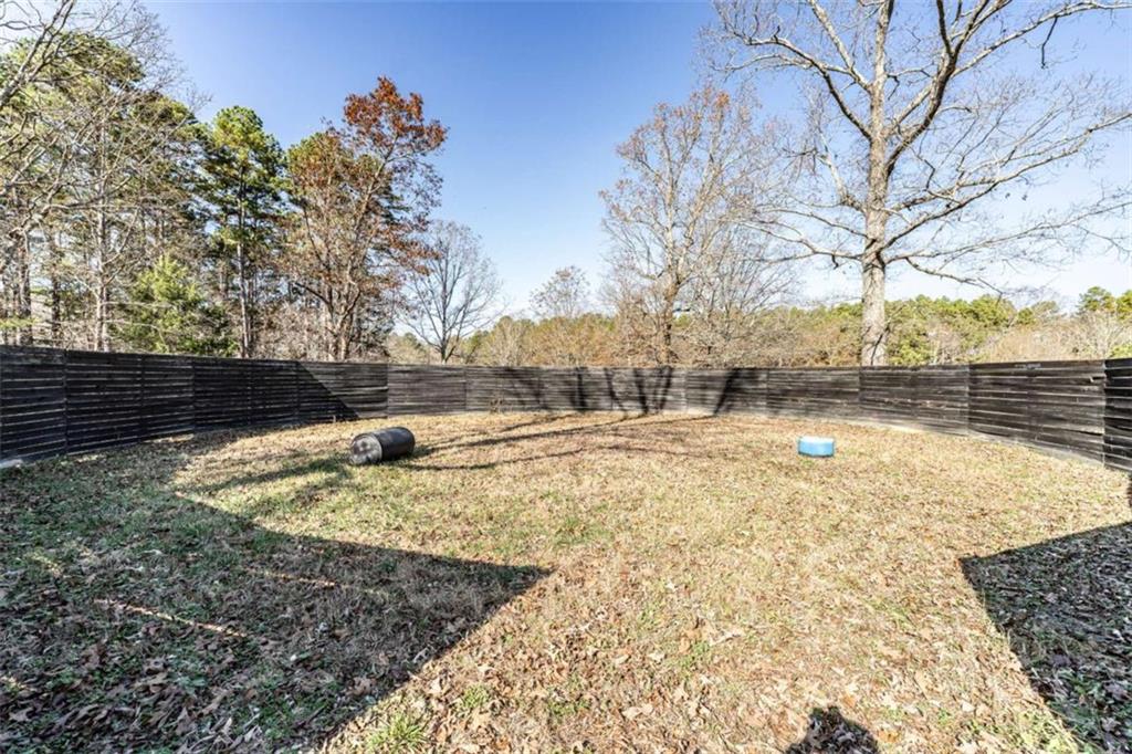 159 Ward Mountain Road Kingston, GA 30145 - Photo 72 of 75 a view of yard covered with snow in front of house