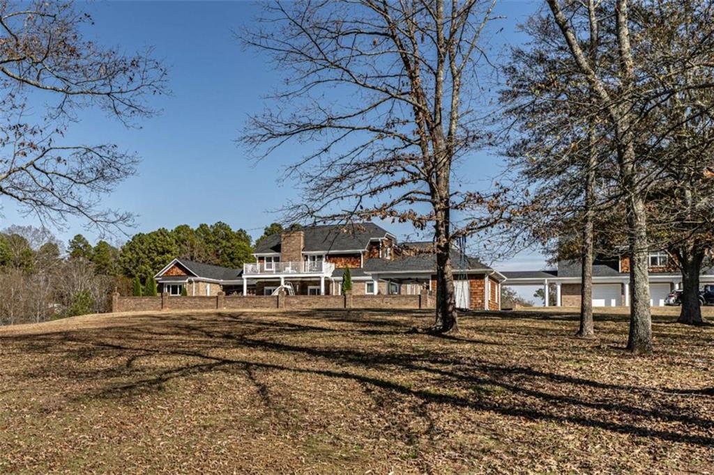 159 Ward Mountain Road Kingston, GA 30145 - Photo 73 of 75 a front view of a house with large trees