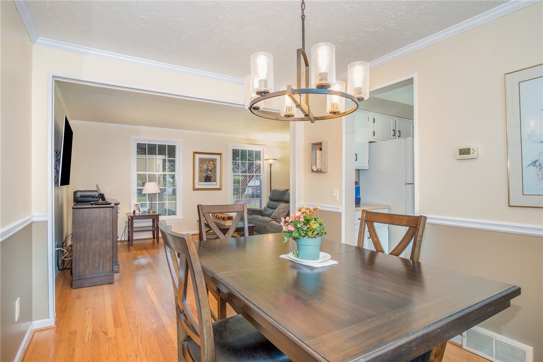 5 Old Drake Run Perinton, NY 14450 - Photo 14 of 39 DINING ROOM LOOKING INTO THE LIVING ROOM