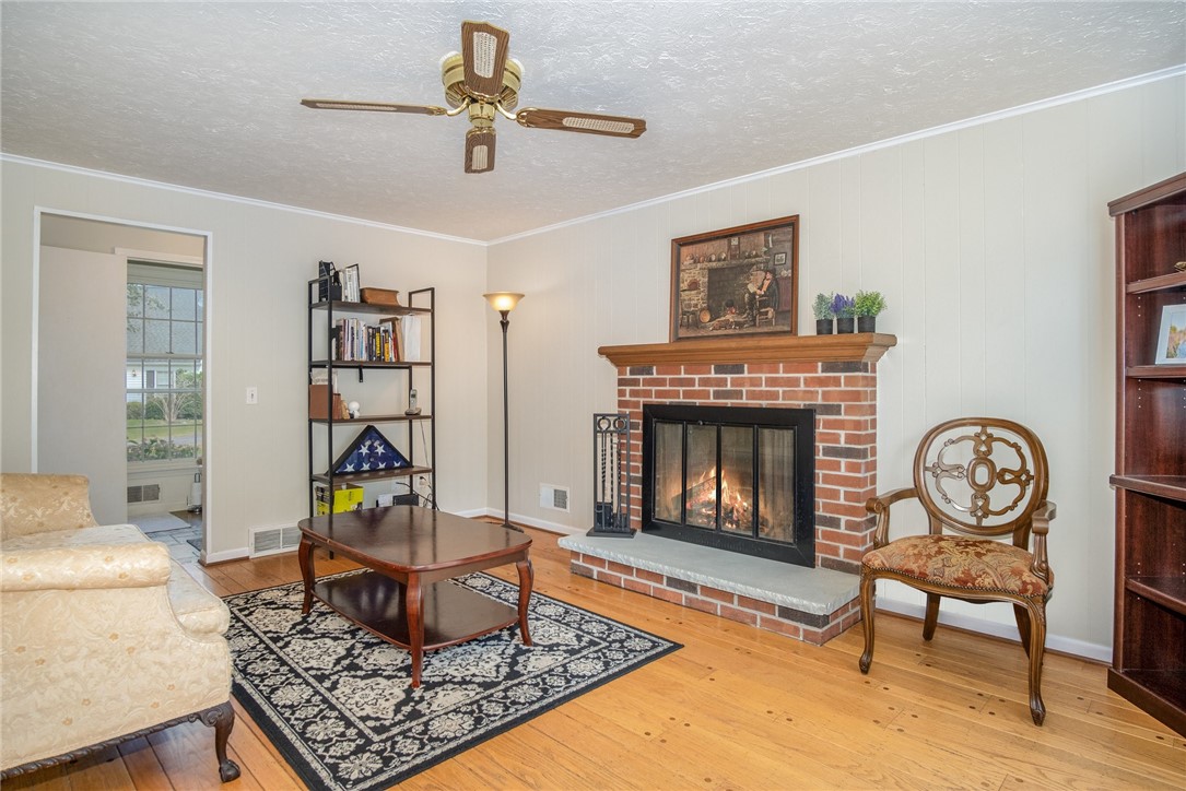 5 Old Drake Run Perinton, NY 14450 - Photo 8 of 39 GATHERING AREA WITH FIREPLACE