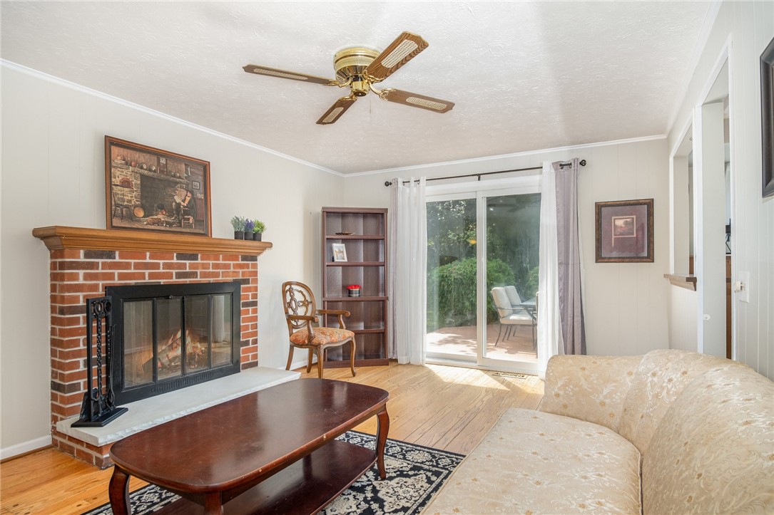 5 Old Drake Run Perinton, NY 14450 - Photo 9 of 39 GATHERING AREA WITH SLIDING DOORS TO DECK