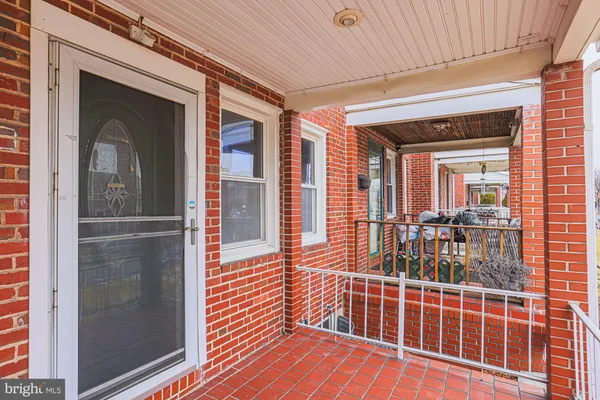 a view of a balcony with a potted plant