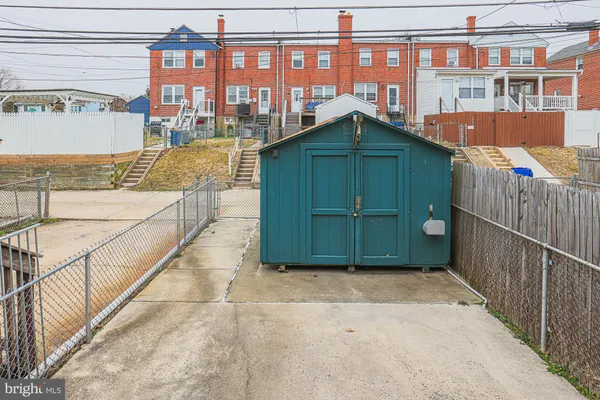 front view of a house with a fence