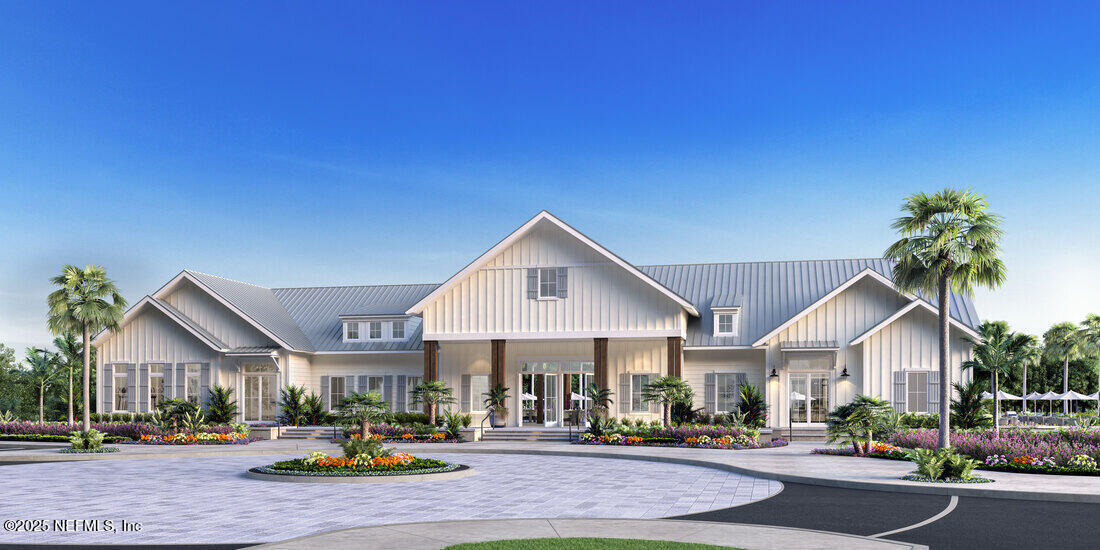 133 Pine Leaf Drive St. Augustine, FL 32092 - Photo 20 of 26 a front view of a building with parked cars