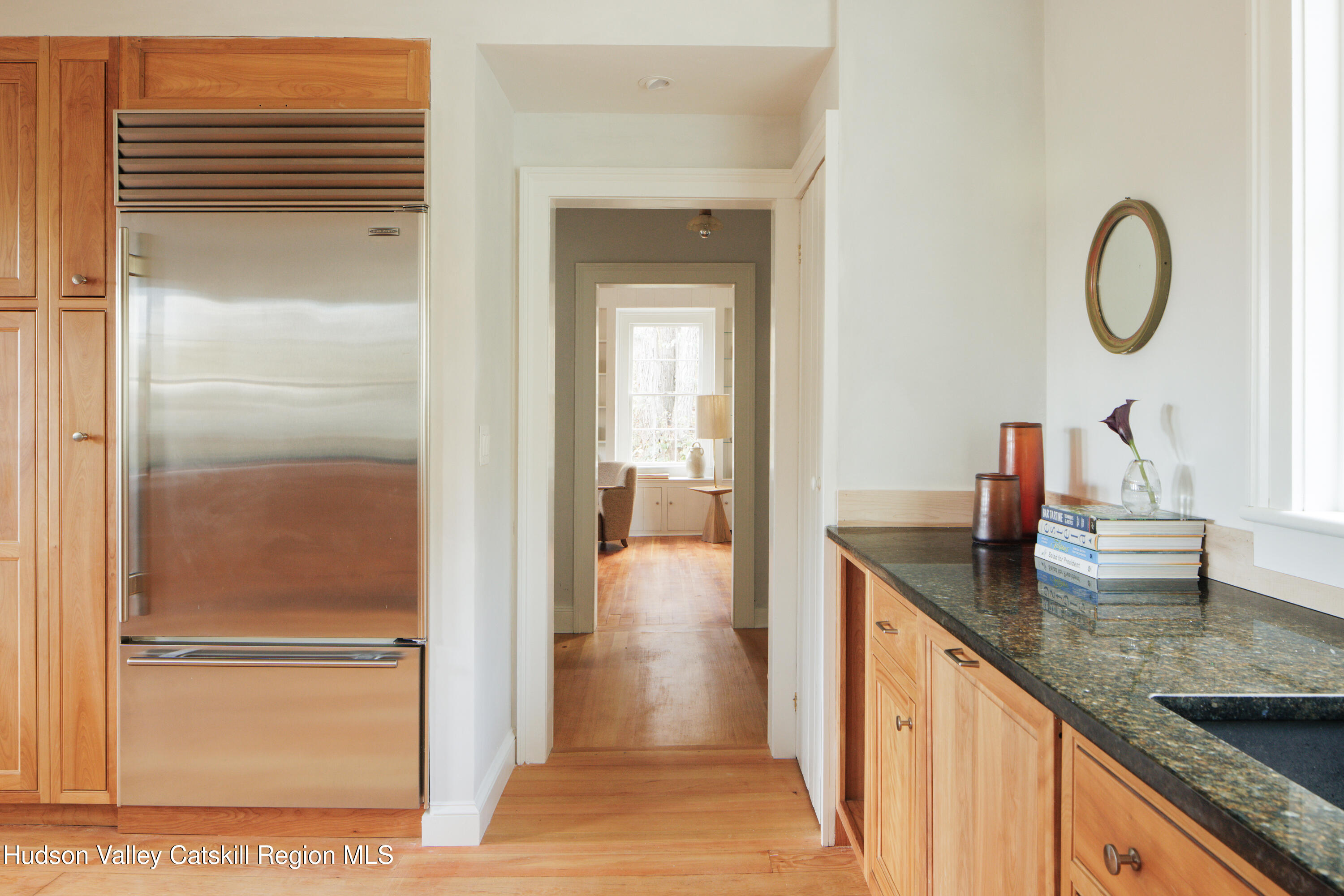 202 Blue Hill Road Hudson, NY 12534 - Photo 15 of 27 a en suite bathroom with a granite countertop sink and a mirror