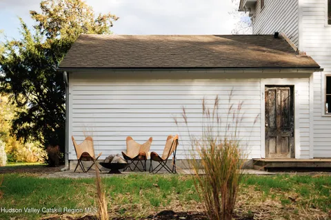 a brick house with a yard