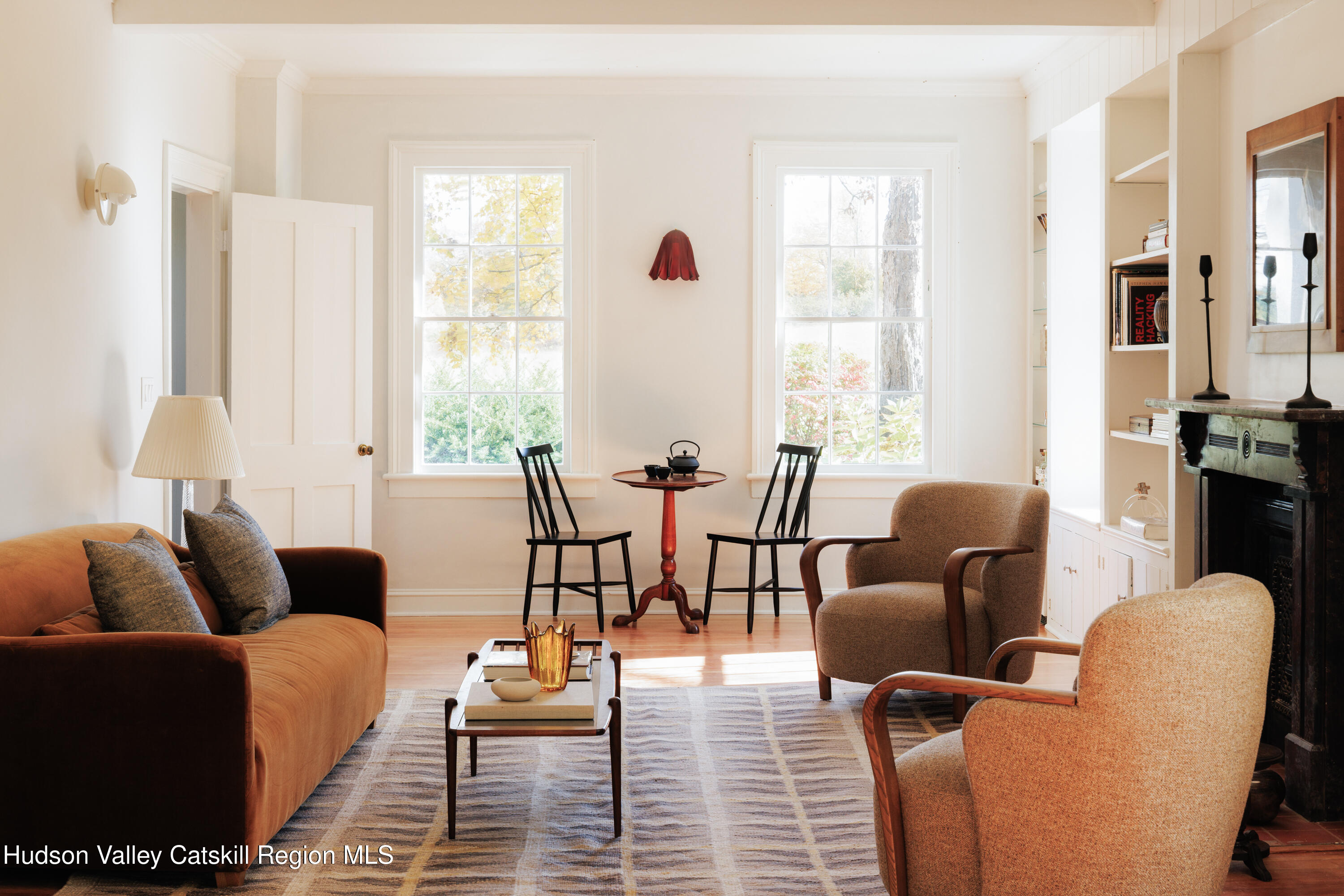 202 Blue Hill Road Hudson, NY 12534 - Photo 4 of 27 a living room with furniture and a large window