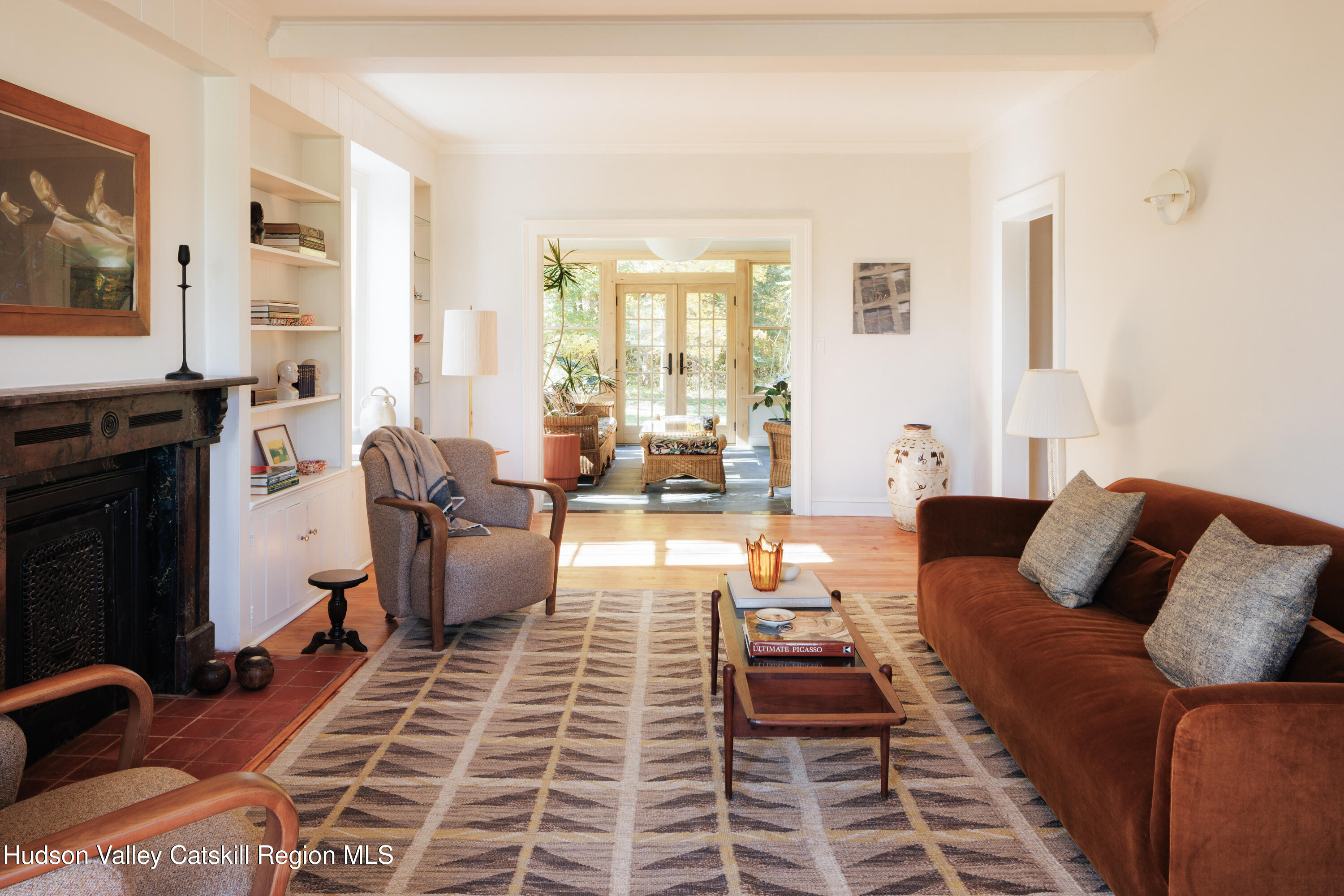 202 Blue Hill Road Hudson, NY 12534 - Photo 5 of 27 a living room with furniture and a fireplace