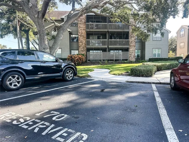 a car parked in front of a house