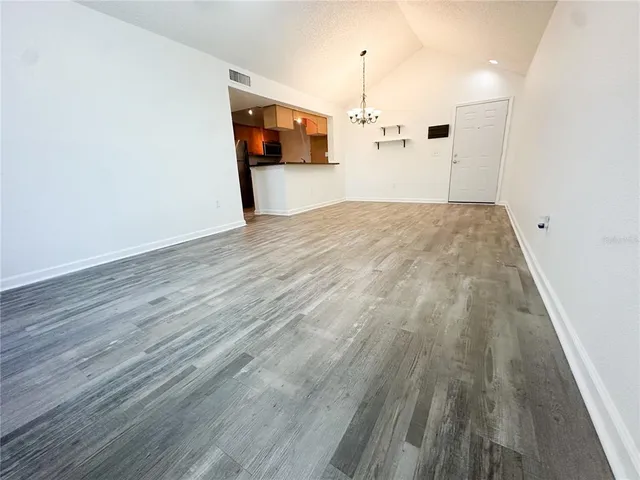 a view of a big room with wooden floor