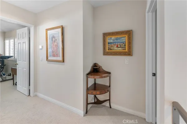 a view of a hallway with front door