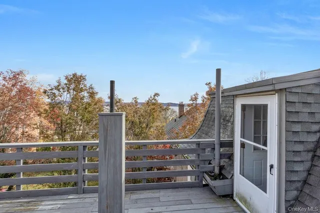 a view of a balcony with an outdoor space