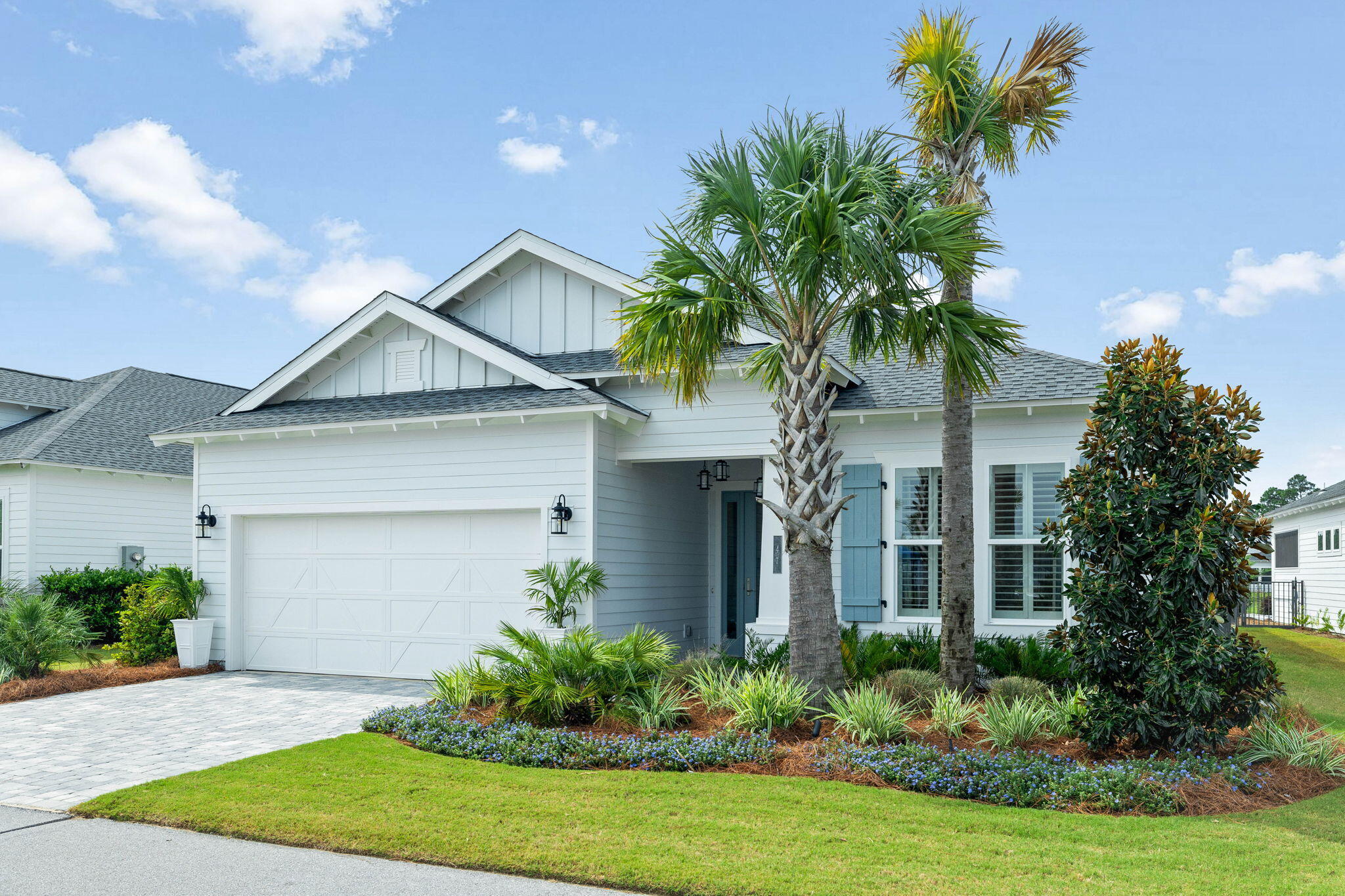 47 West Lafayette Rd Inlet Beach Inlet Beach, FL 32461 - Photo 1 of 71 a front view of a house with a yard and garage
