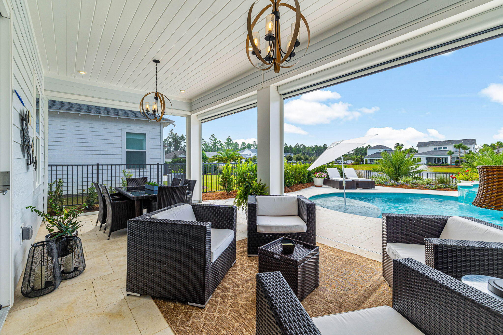 47 West Lafayette Rd Inlet Beach Inlet Beach, FL 32461 - Photo 36 of 71 a living room with patio furniture and a floor to ceiling window