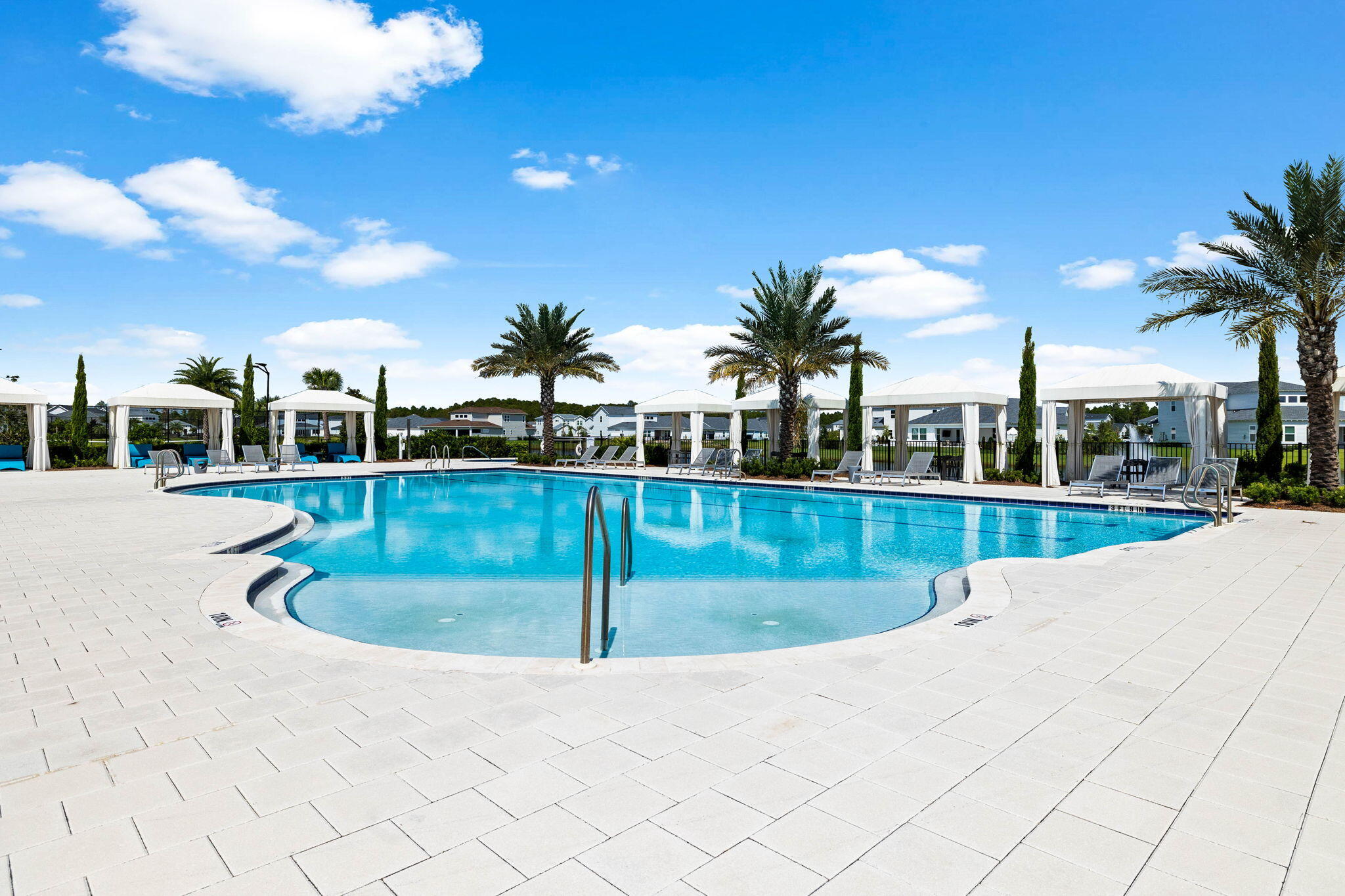 47 West Lafayette Rd Inlet Beach Inlet Beach, FL 32461 - Photo 56 of 71 a view of a swimming pool with a lawn chairs and palm tree