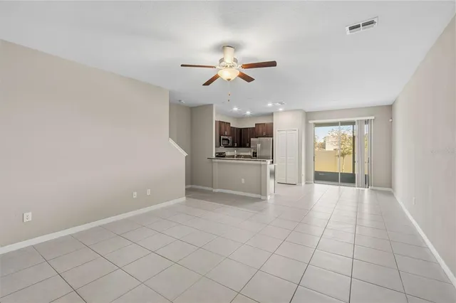a view of a kitchen with a sink and a kitchen