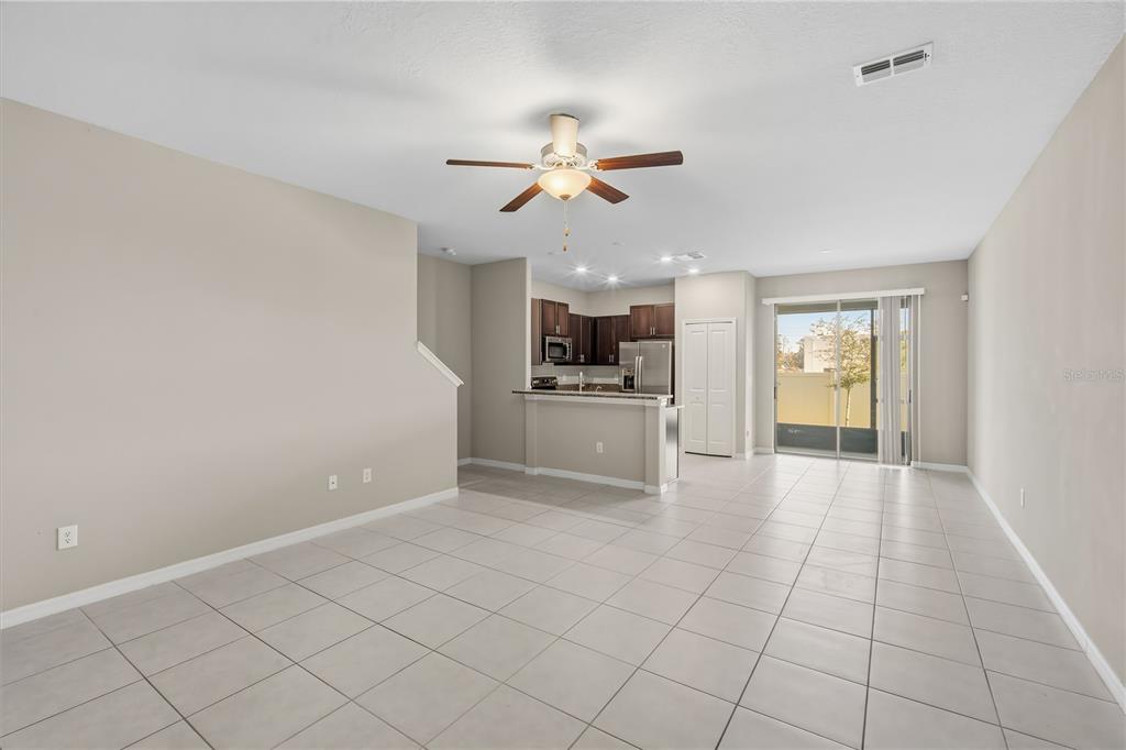 14316 Easy Goer Street Sun City Center, FL 33573 - Photo 9 of 26 a view of a kitchen with a sink and a kitchen