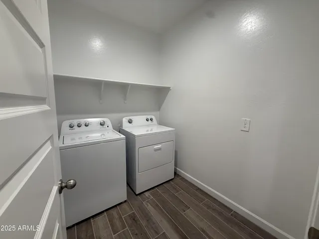 a utility room with dryer and washer