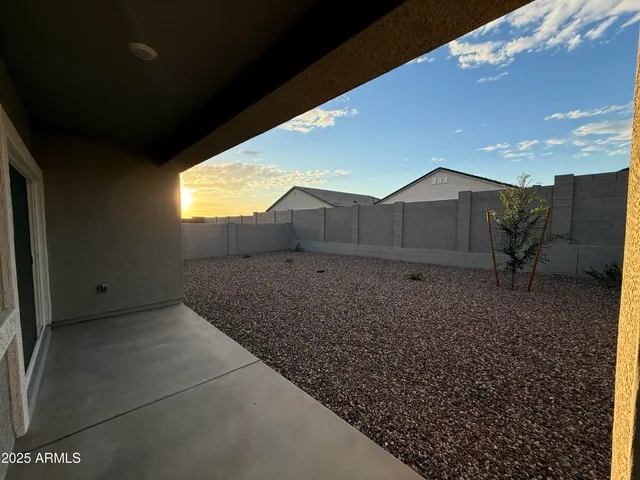 a view of a swimming pool with a sitting space
