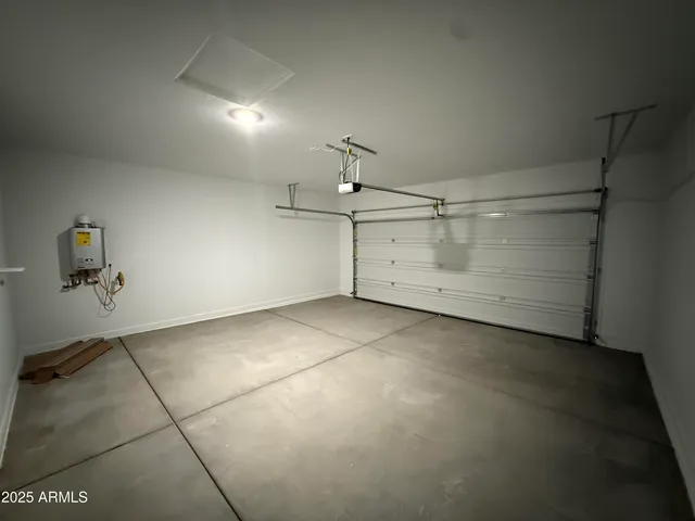 a view of a patio with swimming pool table and chairs
