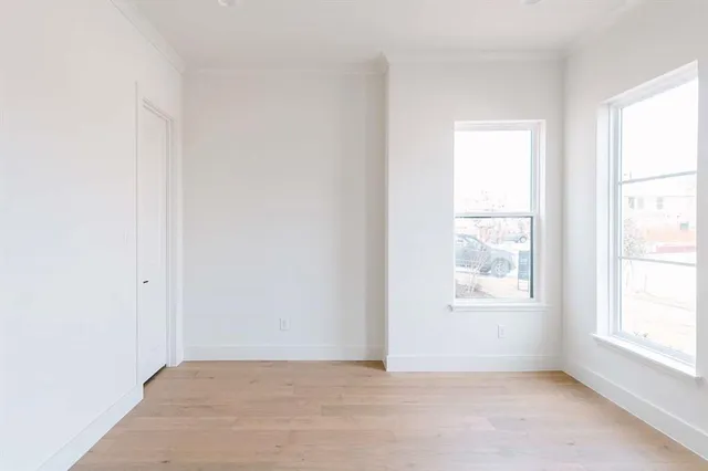 an empty room with windows