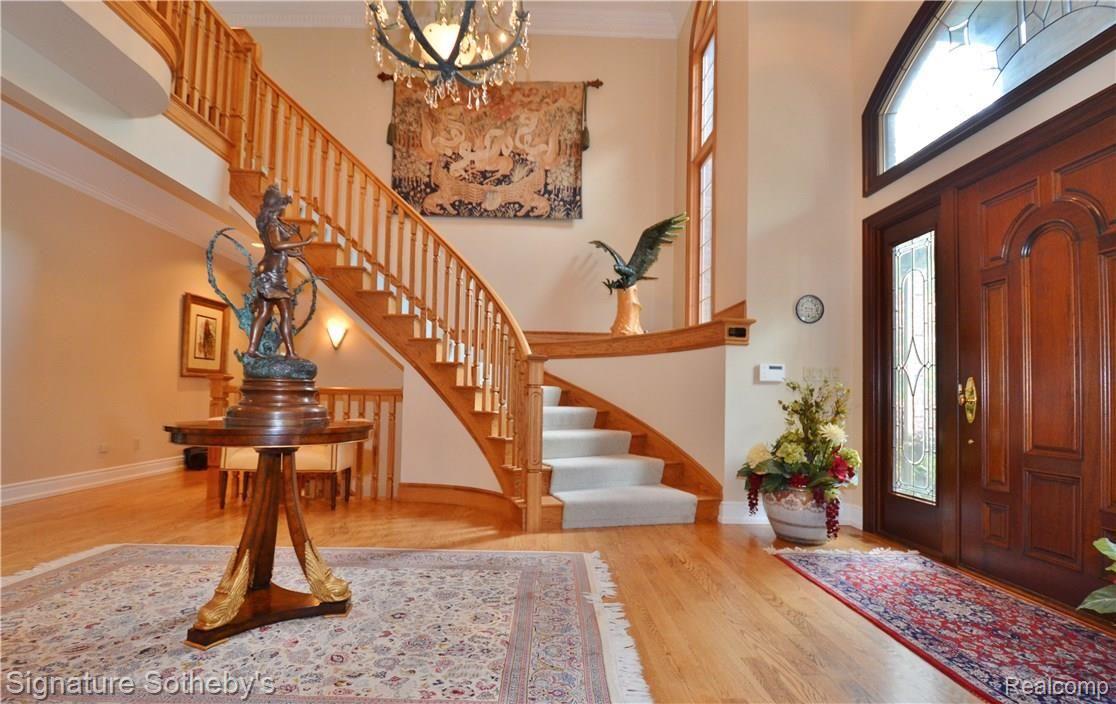 8400 Ridge Road Canton, MI 48187 - Photo 15 of 69 Winding Staircase to Bridge over Foyer and Great Room