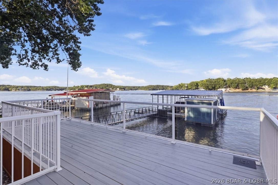 2202 Spring Cove Road Sunrise Beach, MO 65079 - Photo 26 of 57 Lower deck offers more outdoor space