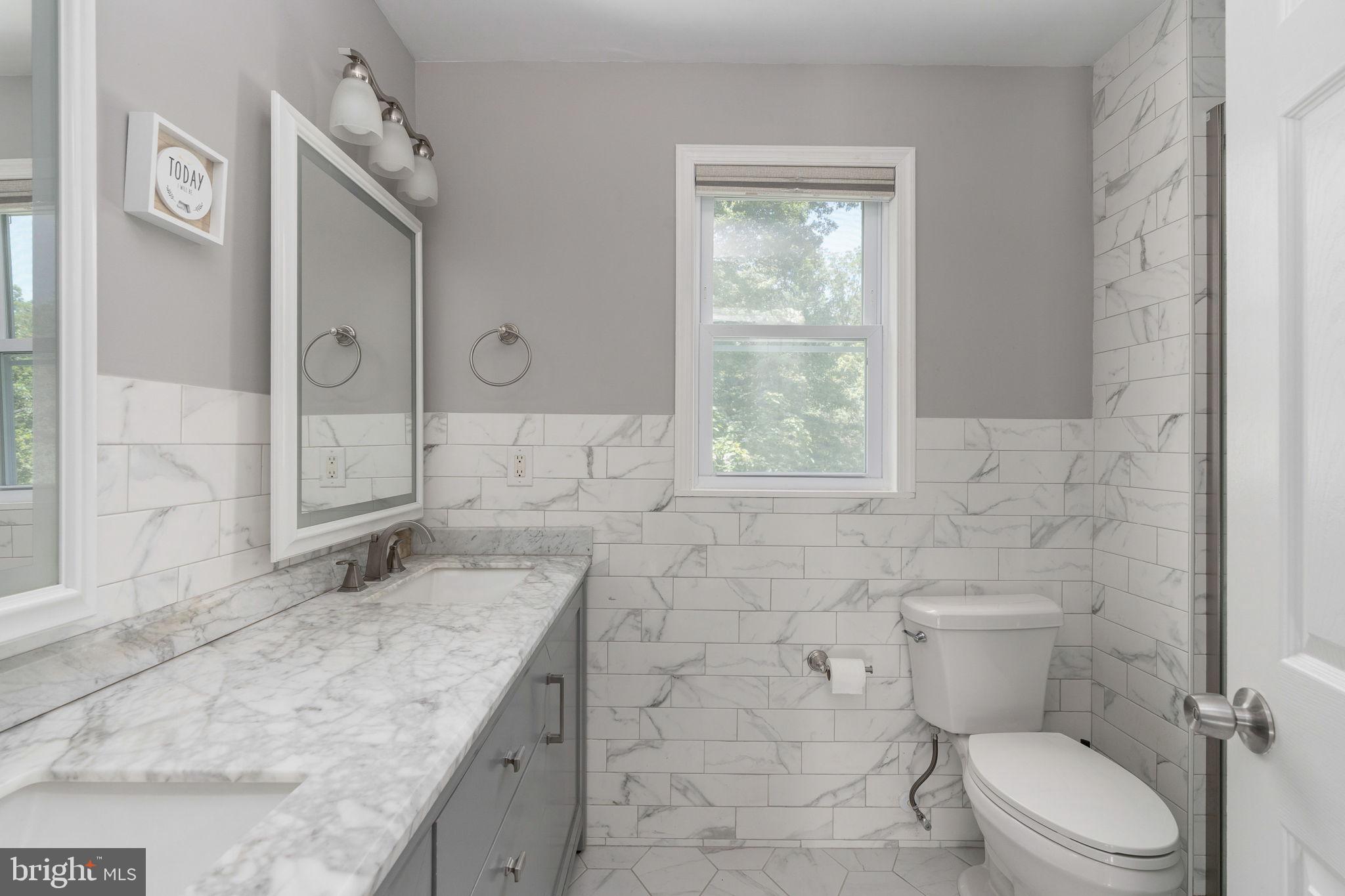 8009 Burrell Road Fredericksburg, VA 22407 - Photo 28 of 66 Elegant marble bathroom retreat.