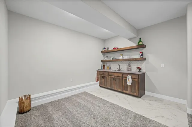 $600,000 | 814 Northwest Hickory Ridge Drive, Grain Valley, MO 64029