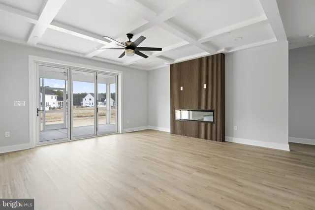 a view of a kitchen with a stove cabinets and wooden floor